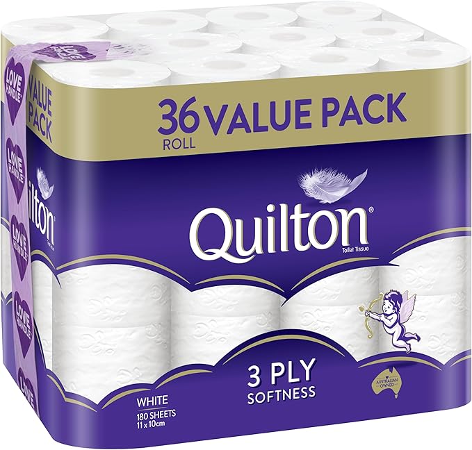 Quilton 36 Roll Value Pack toilet paper in a purple and gold cardboard package with white paper rolls visible, labeled 3 ply softness and white.